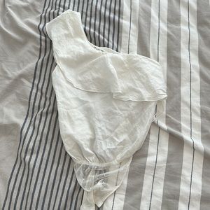 Free people body suit with ruffle!